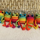 Rainbow cuddly frog and fiddle toy 