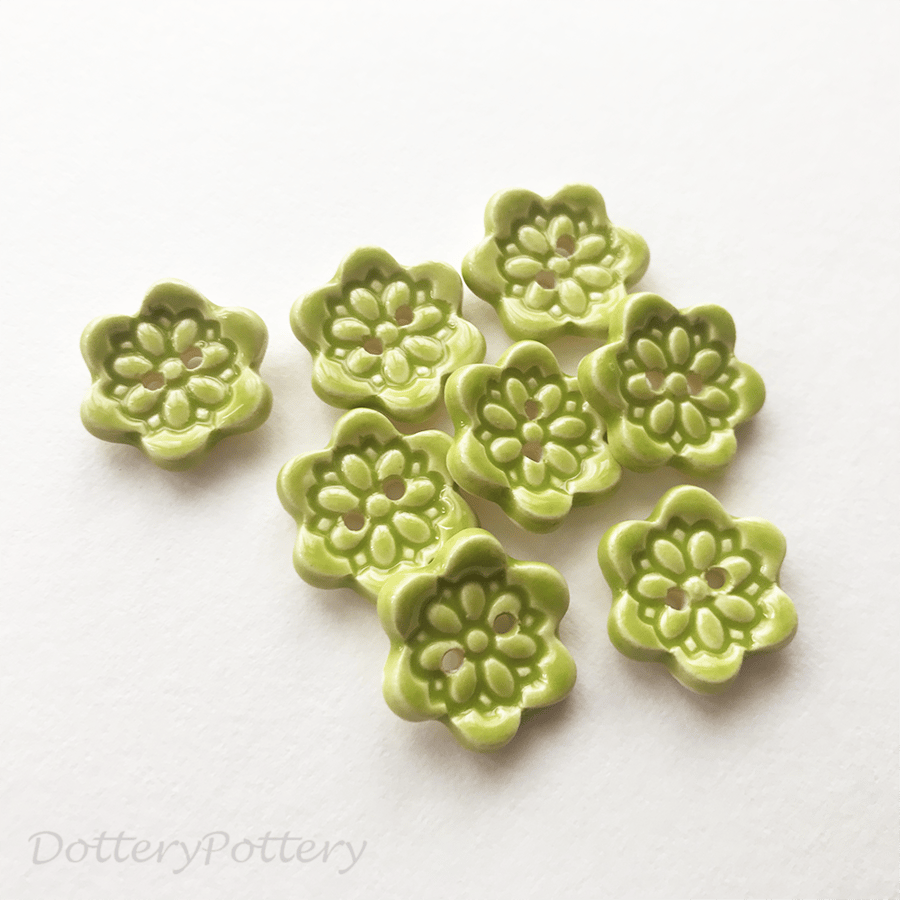 Set of eight little handmade ceramic buttons green