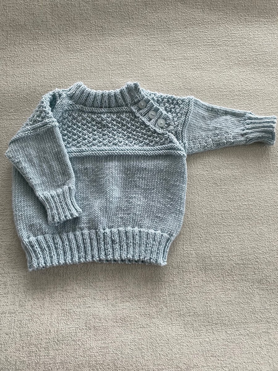 Jumper with patterned yoke