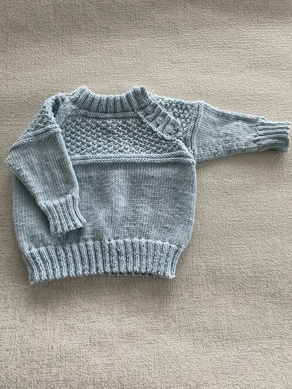 Jumper with patterned yoke