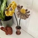 Wool, crochet natural fibre daisies. Two daisies mounted in a wooden spool 