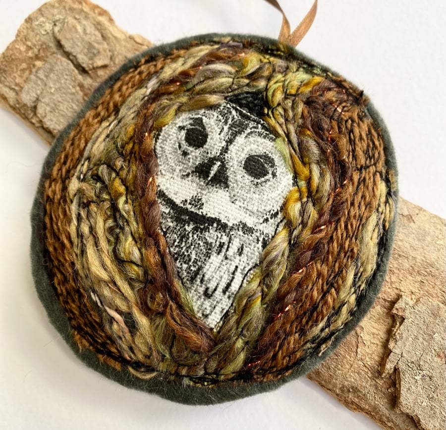 Upcycled embroidered owl in a tree home decoration. 