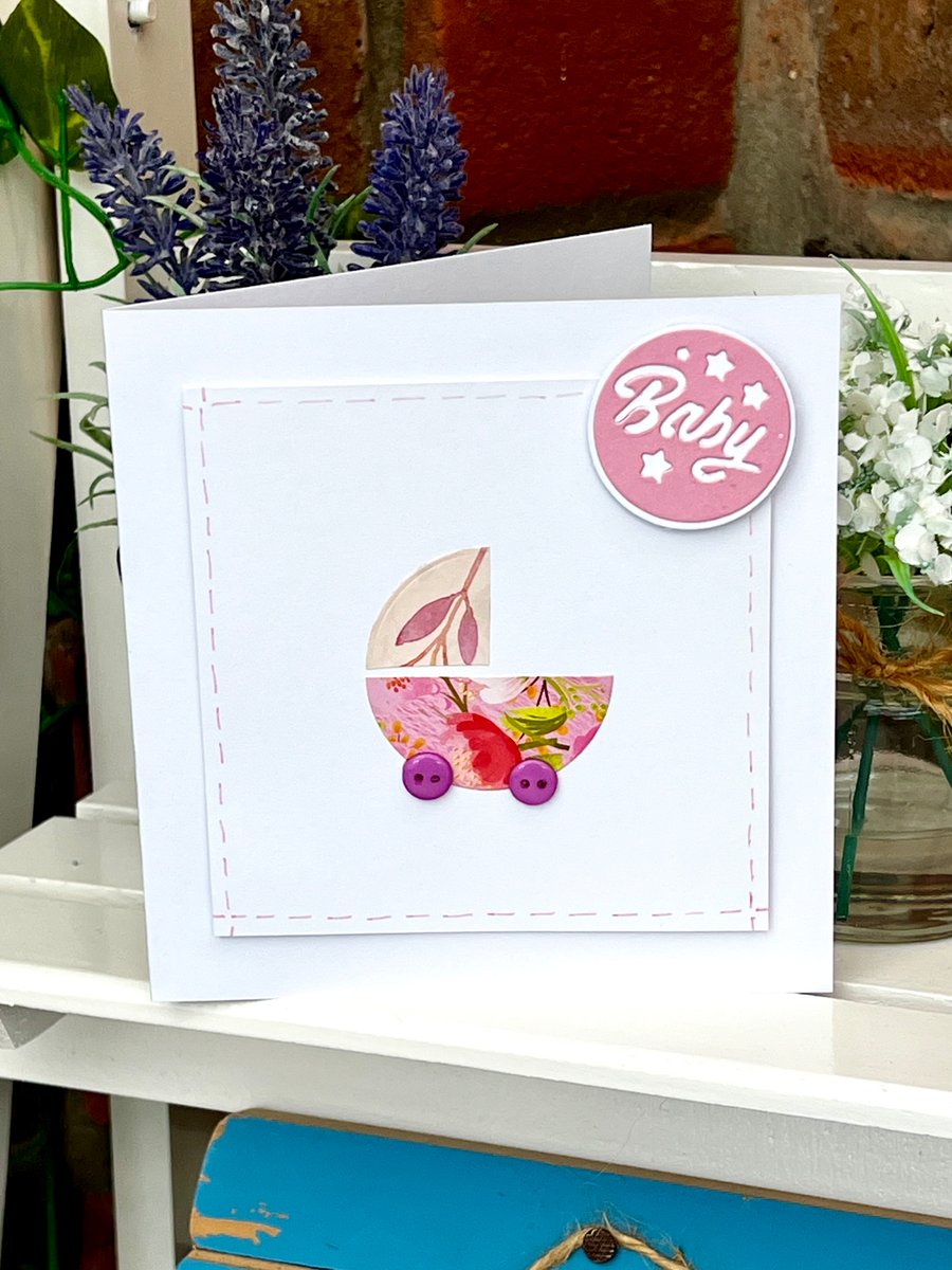 New baby girl card - purple pram wheels