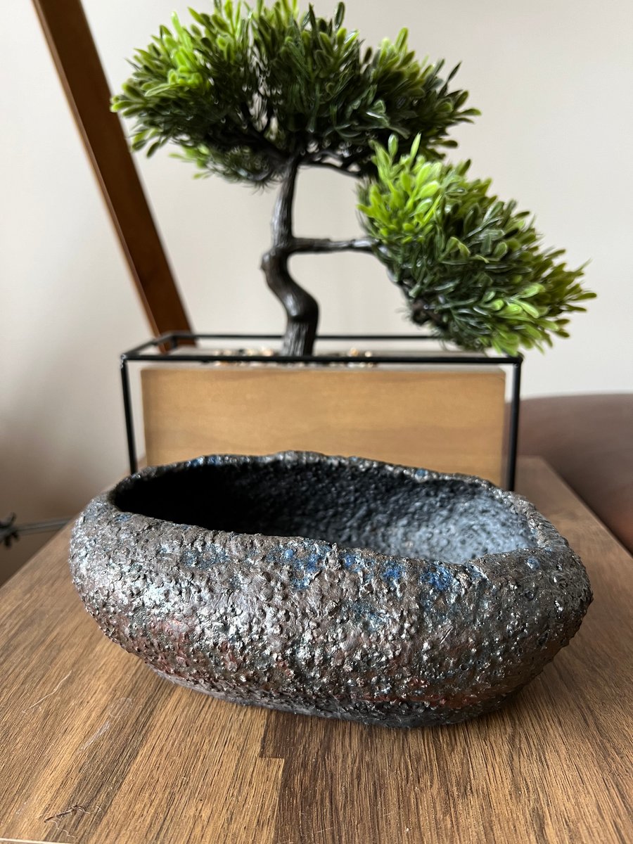 Coarse textured black ceramic bowl