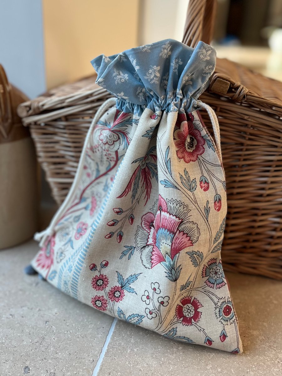 Pink and blue floral print linen drawstring bag with Laura Ashley cotton lining