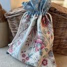 Pink and blue floral print linen drawstring bag with Laura Ashley cotton lining