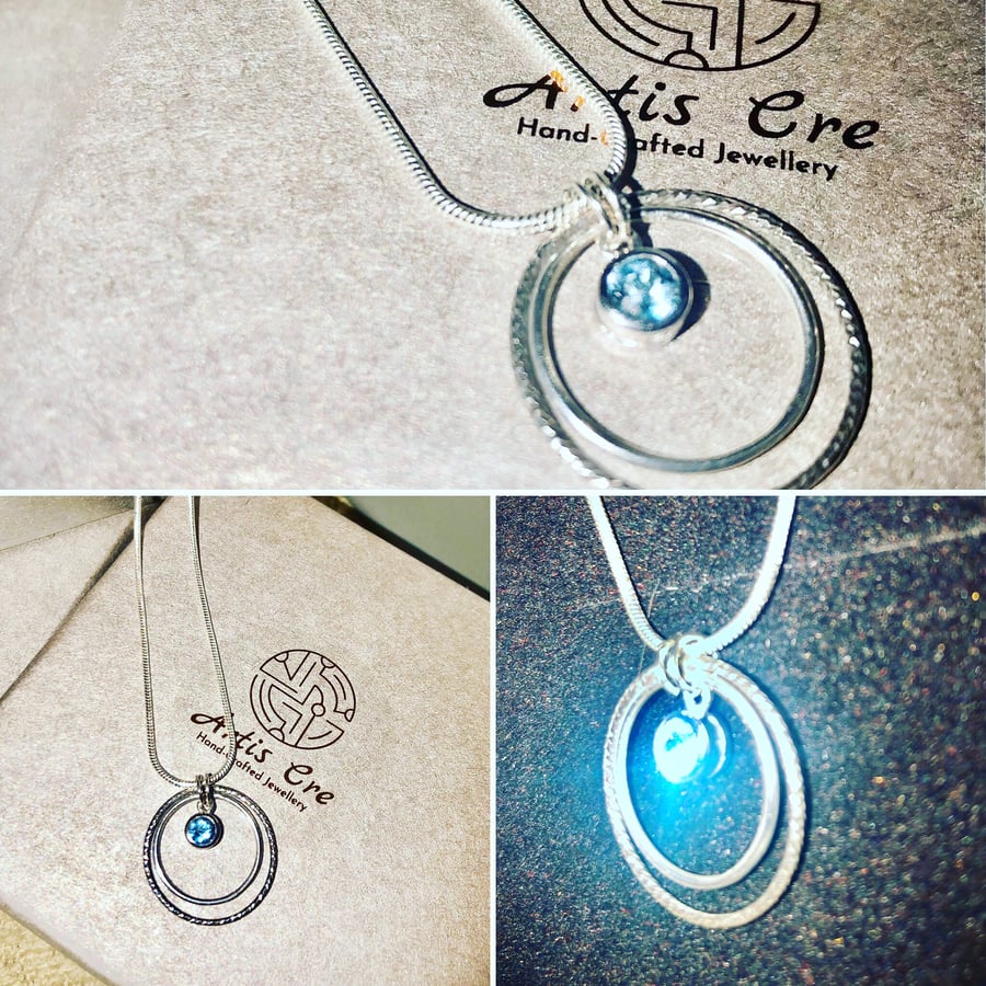 Sterling Silver Circles with Striking Blue Topaz gemstone charm 18” snake chain