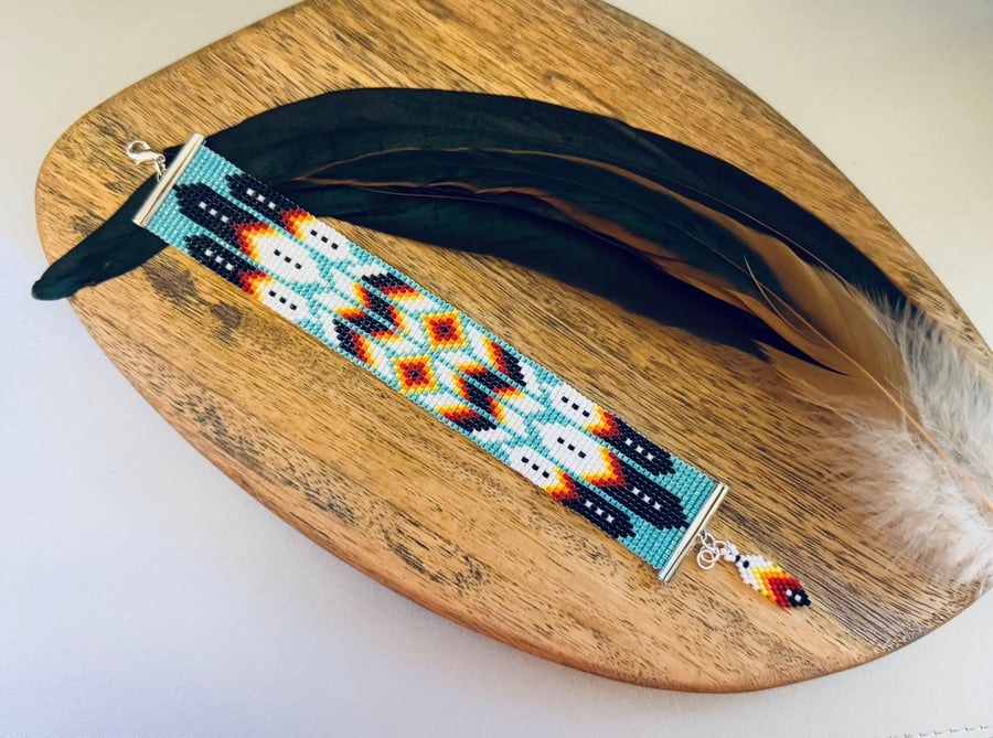 Native American inspired bead woven feather bracelet