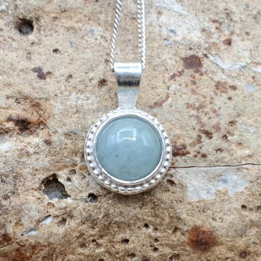 Tiny blue Aquamarine Pendant. March birthstone