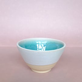 White and turquoise bowl