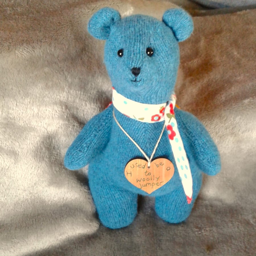Teddy bear from repurposed teal woolly jumper with flowery neckerchief
