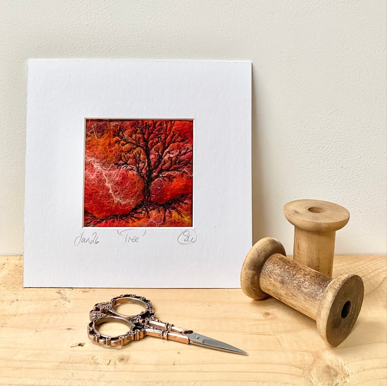 Tree silhouette with sunrise, original wet felting artwork.