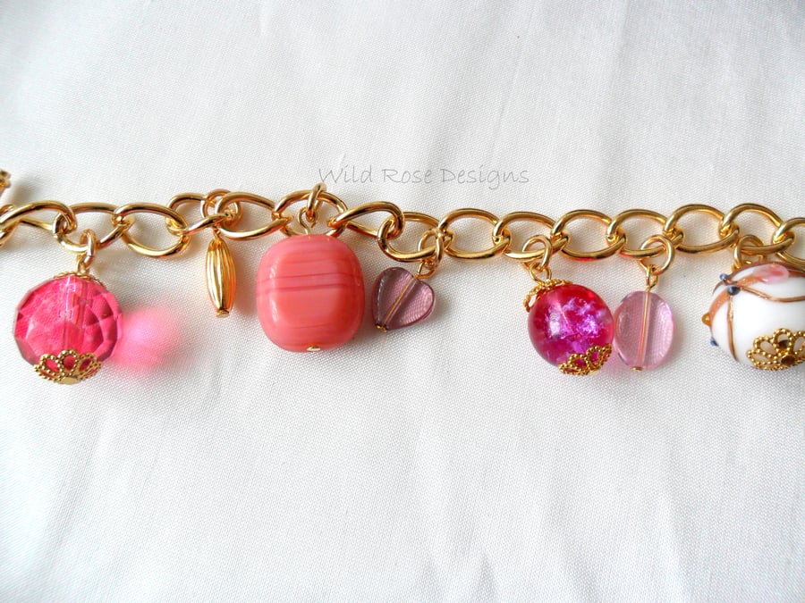 Pink charm style bracelet Folksy