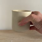 Handmade small ceramic dimple mug, cream handleless mug