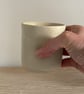 Handmade small ceramic dimple mug, cream handleless mug - Image 1