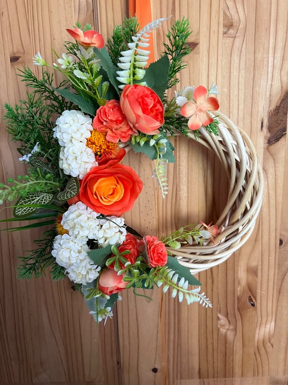 Red and orange wicker door wreath 
