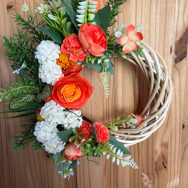 Red and orange wicker door wreath 