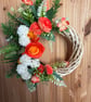 Red and orange wicker door wreath 