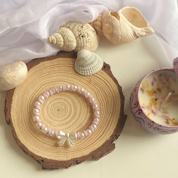 Lilac Clay Bead Bracelet with Bow Charm