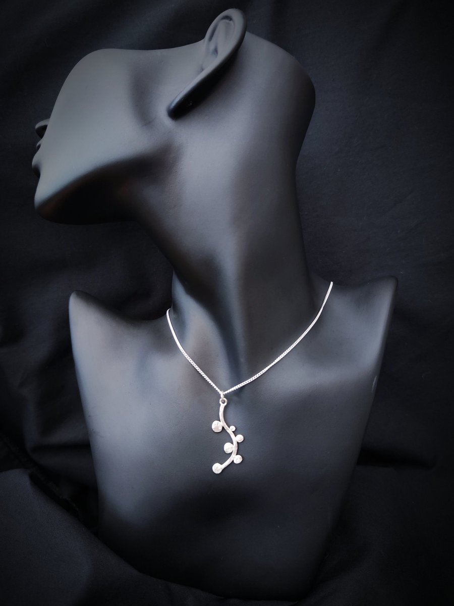 Silver wavy twig pendant