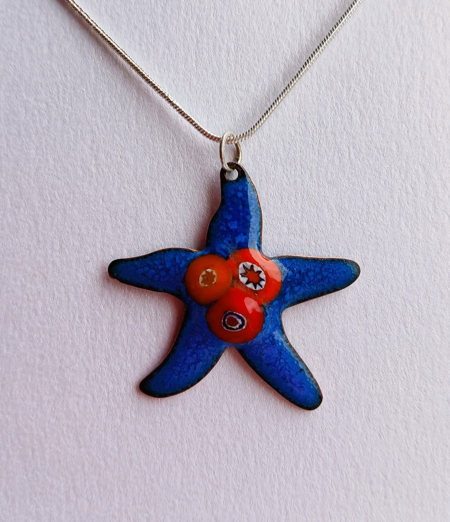 Starfish pendant in blue and red enamel on copper 269