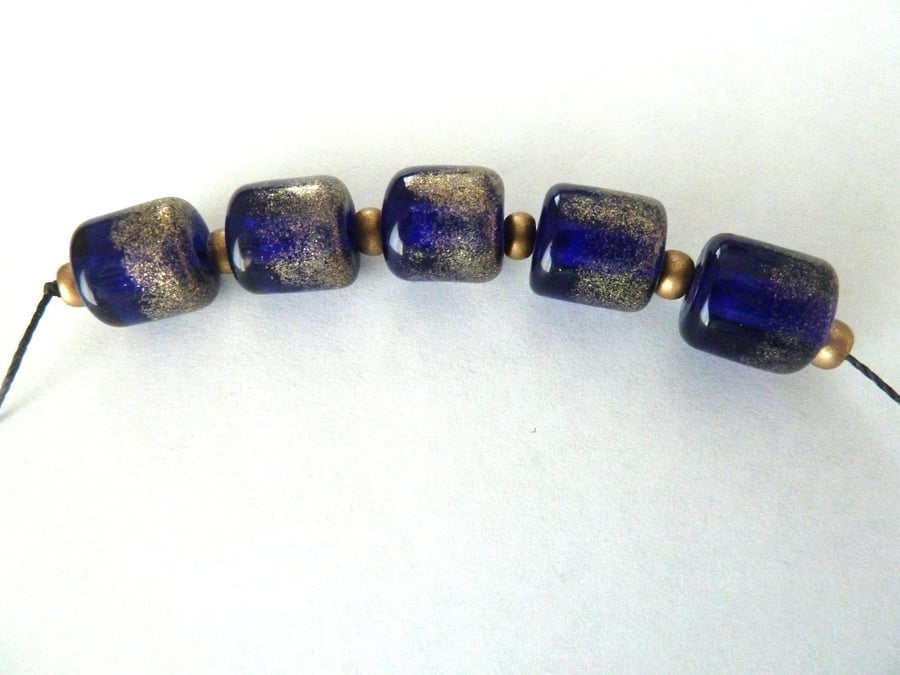 handmade lampwork blue barrel beads