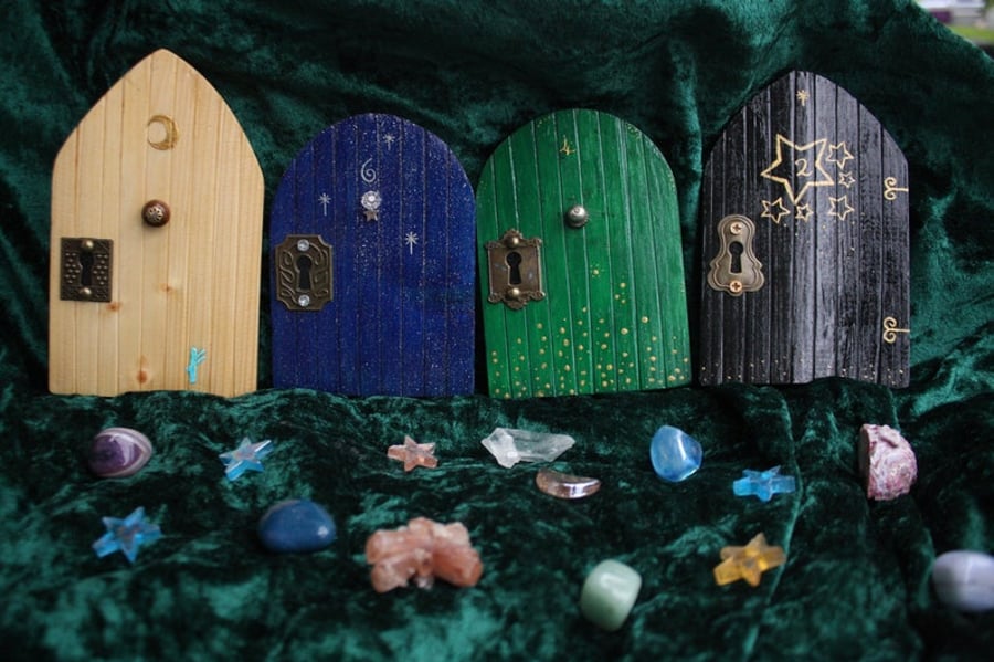 Wooden fairy or wizard door in blue, black, green
