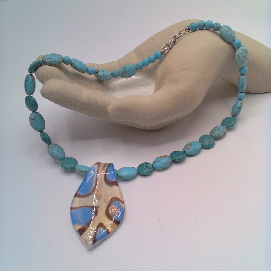 Pale Blue and White Glass Pendant with Gold Flecks on a Turquoise Necklace