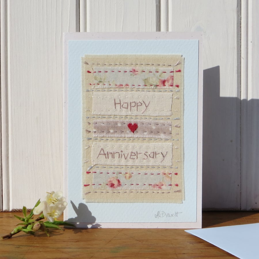 Hand-stitched, pretty little card with applique heart and recycled cottons