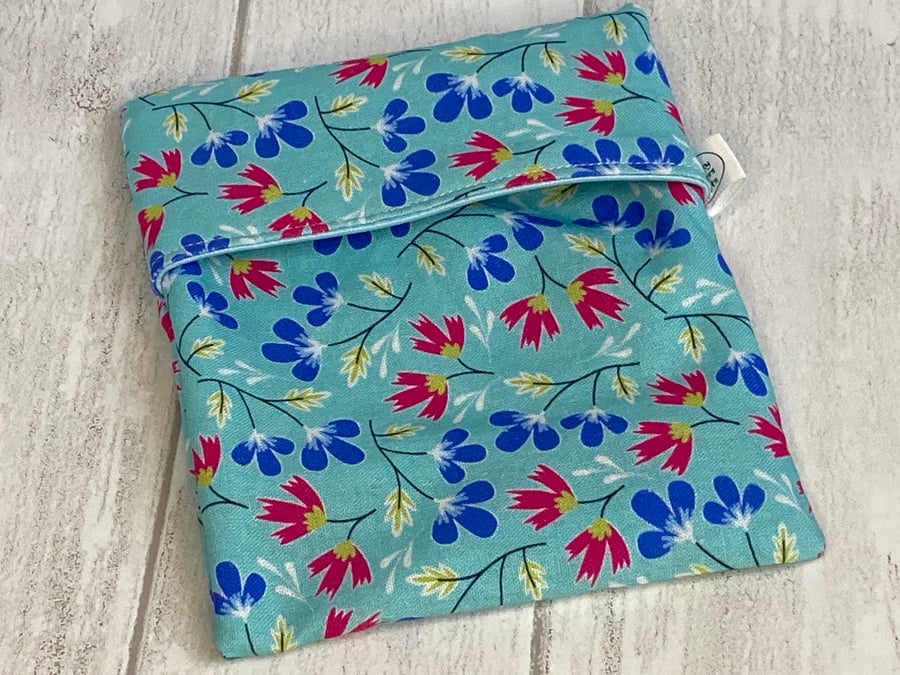 Reusable snack bag with food safe lining. Blue floral. Seconds