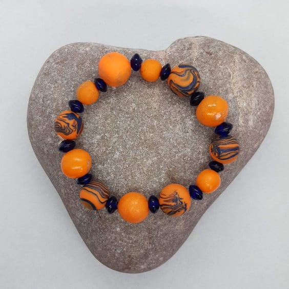 Bright orange and blue polymer clay bracelet