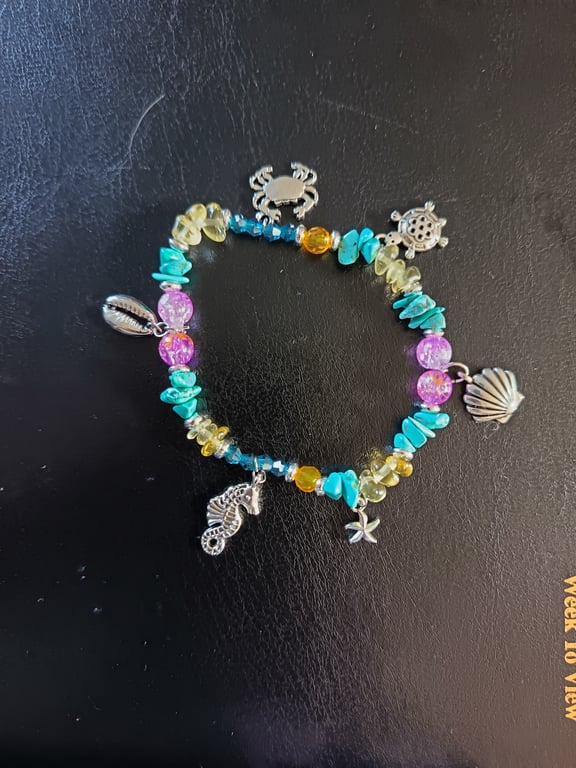 Elasticated nautical charm bracelet with beads and crystal chip 