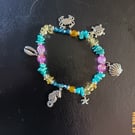 Elasticated nautical charm bracelet with beads and crystal chip 