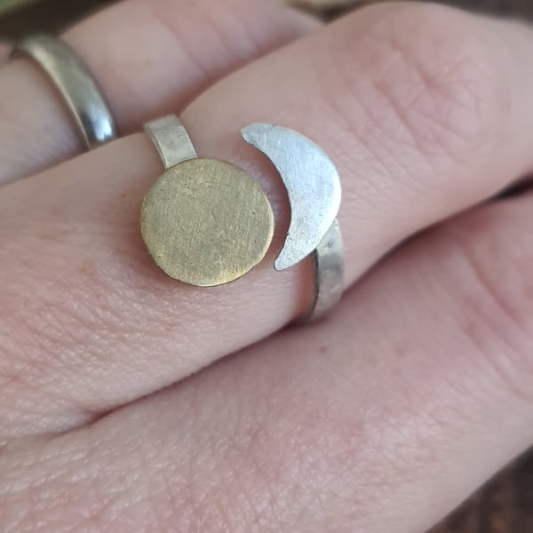 Sun and moon chaser ring in silver and brass