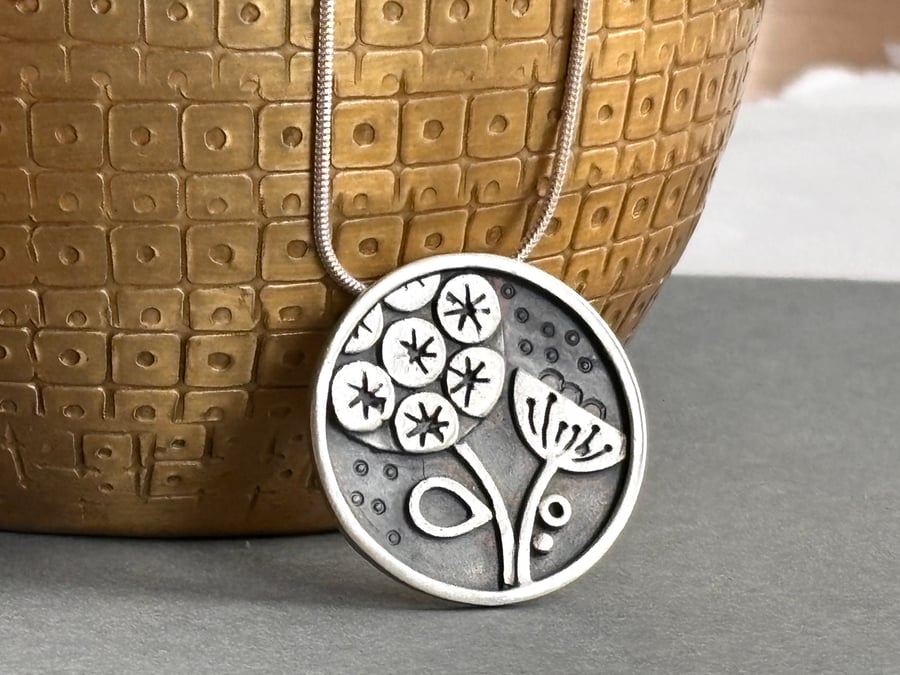 Seed head silver pendant 