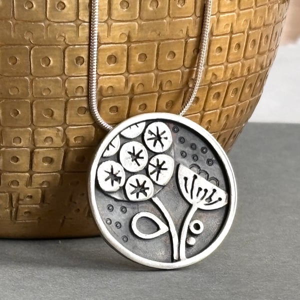 Seed head silver pendant 