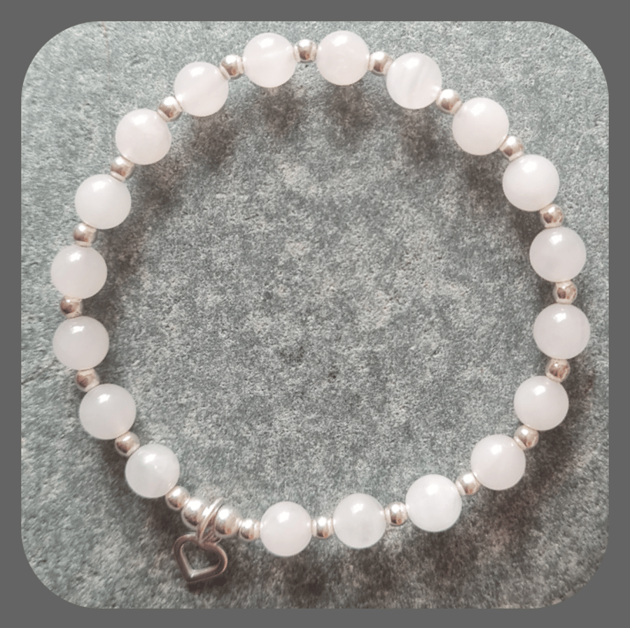 Rose Quartz and Sterling Silver beaded Bracelet with Heart Charm.