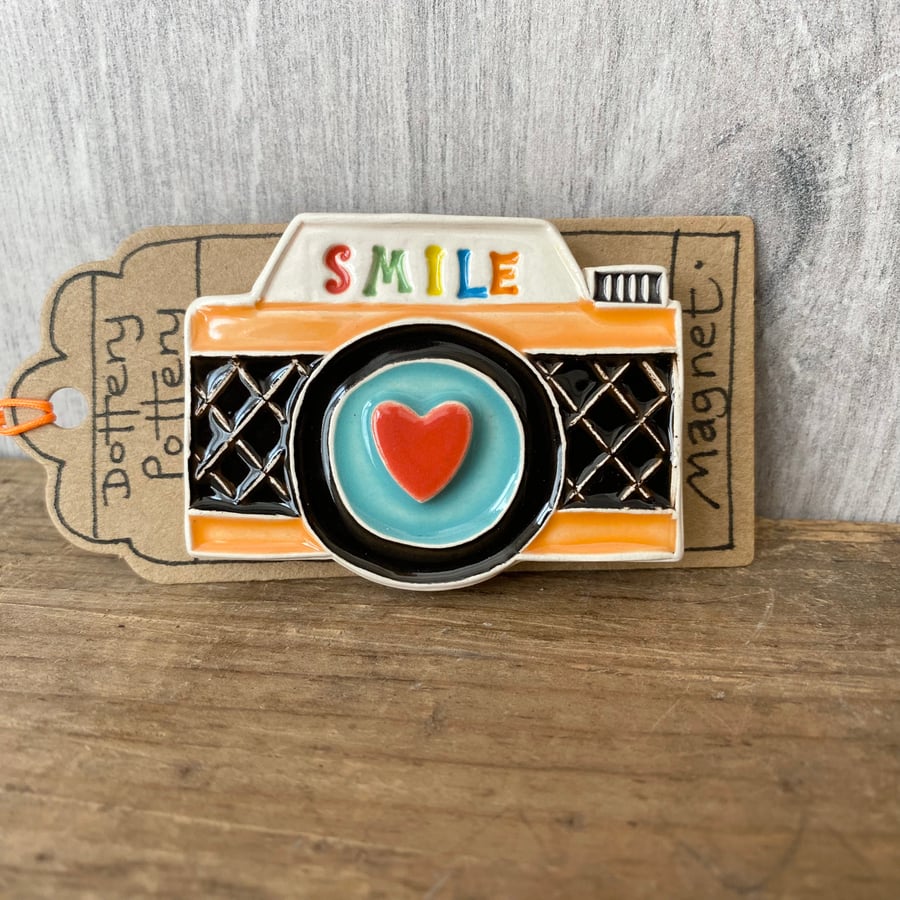 Ceramic camera magnet