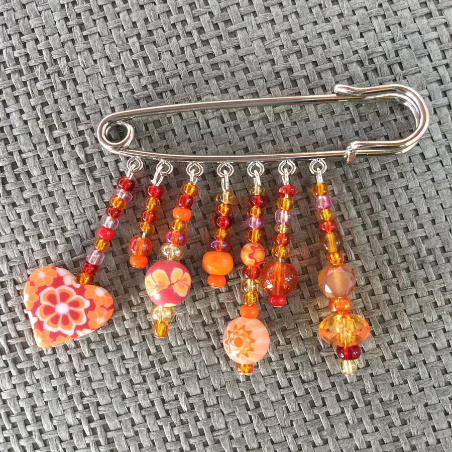 “Orange Heart” beaded kilt pin