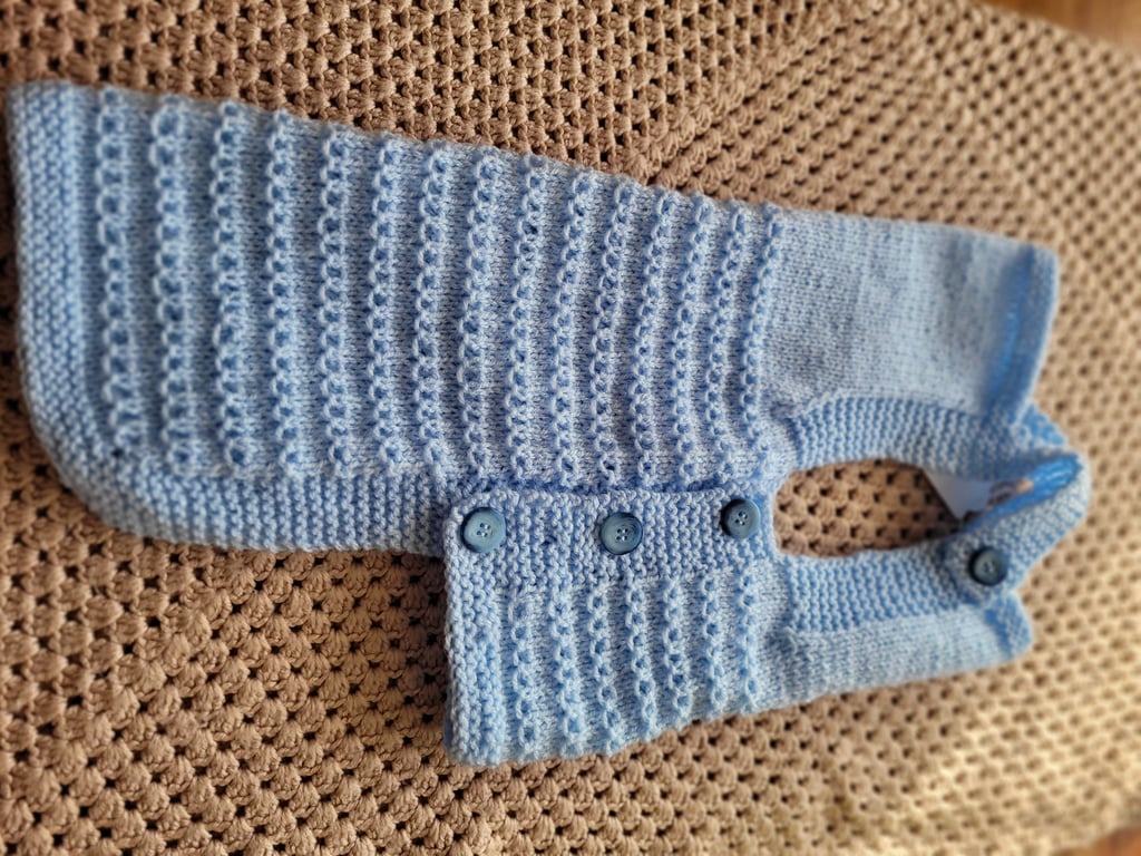 Hand knitted.  Dungarees style dog coat. 