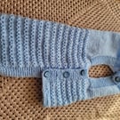 Hand knitted.  Dungarees style dog coat. 