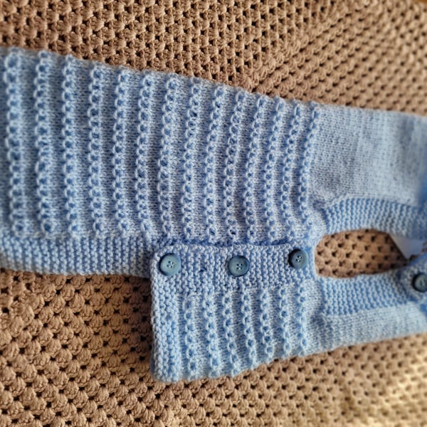 Hand knitted.  Dungarees style dog coat. 