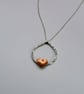 Hammered silver and copper pendant