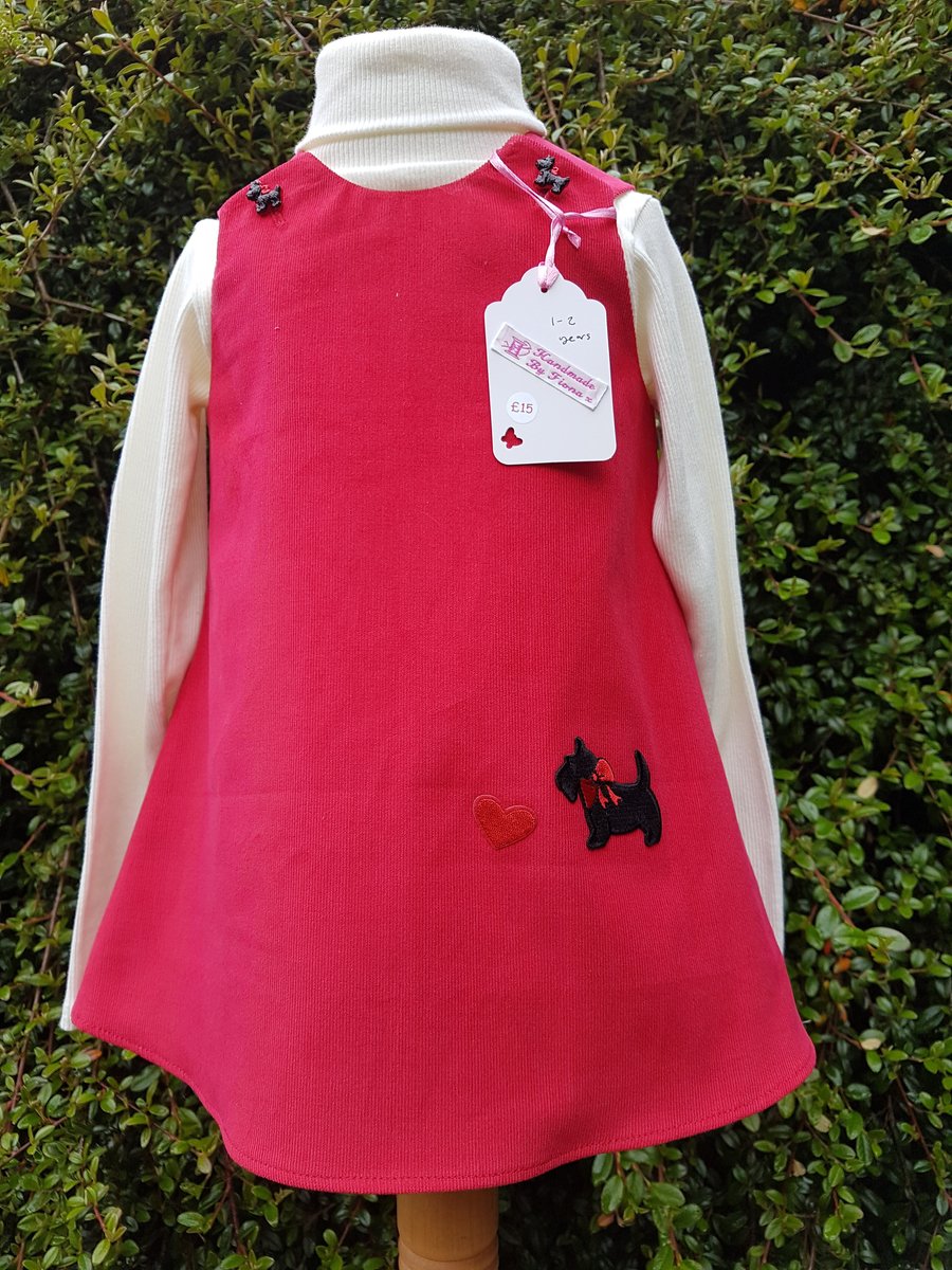 Age: 1-2y. Red baby needlecord pinafore dress. 