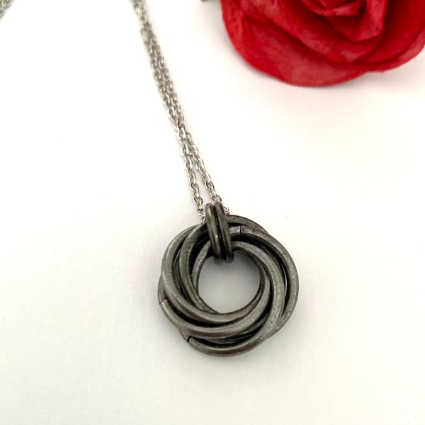 Antique Black Iron Hammered Six Ring Pendant Necklace for 6th Anniversary Gift.