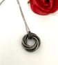 Antique Black Iron Hammered Six Ring Pendant Necklace for 6th Anniversary Gift.