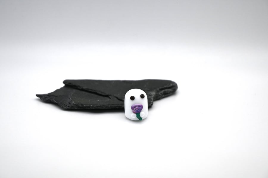 small glass ghost with flower keepsake figure