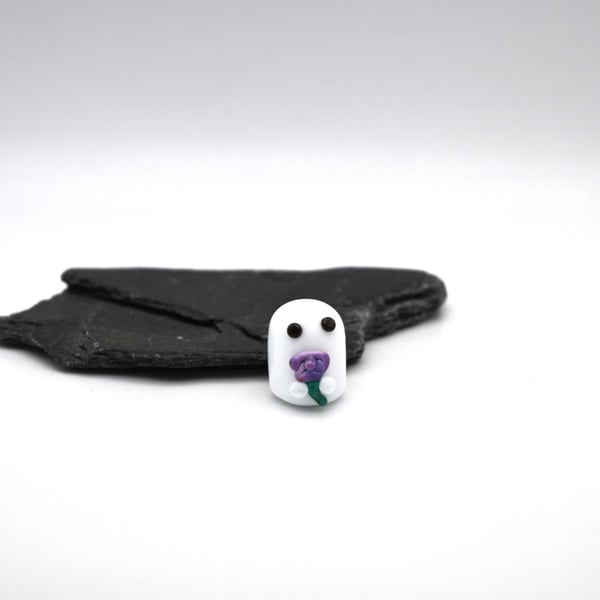small glass ghost with flower keepsake figure