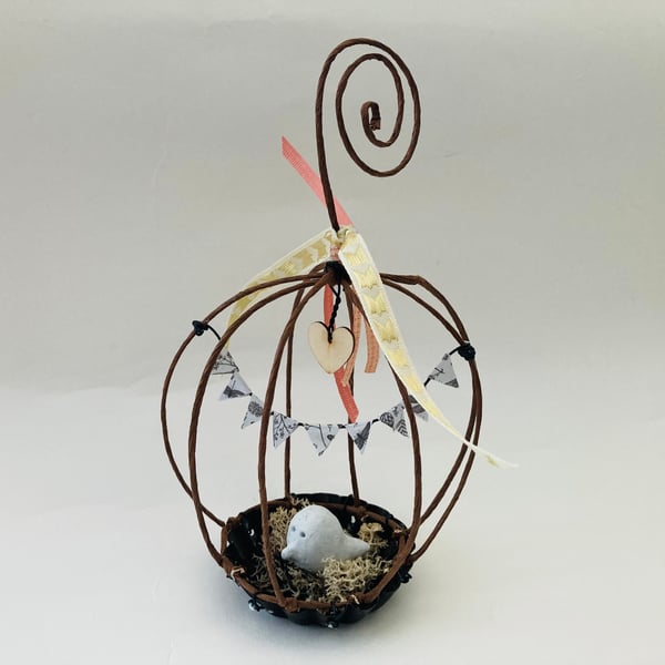Wire bird cage sculpture