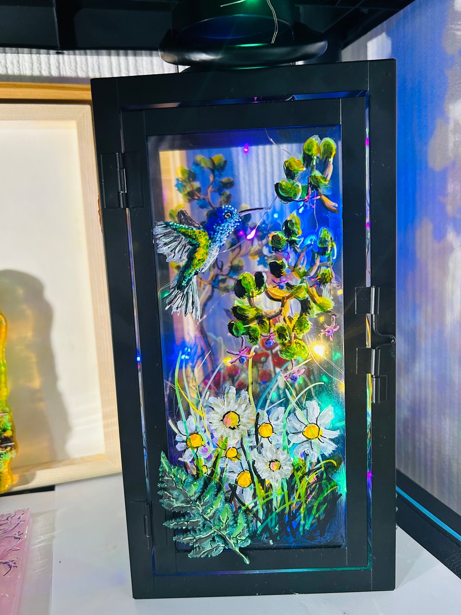 A hand painted and fired glass and metal lantern by Andrew Jenkins 